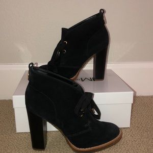 Black and gold tie high heel boots